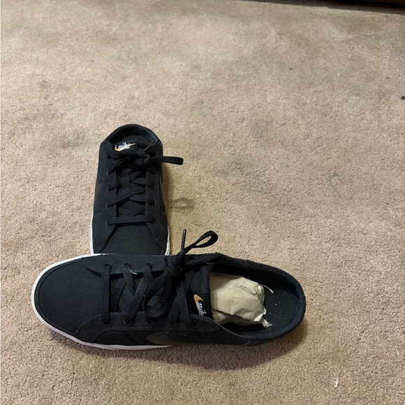 Nike Shoes - Nike Black and White Low-Top Canvas Sneakers